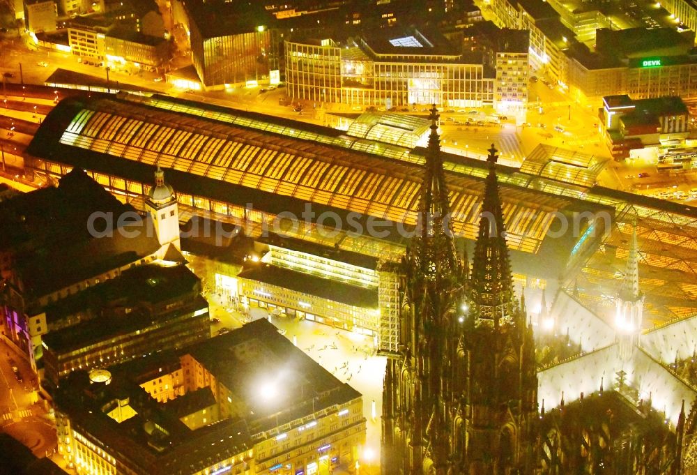 Köln at night from above - Night lighting track progress and building of the main station of the railway in the district Innenstadt in Cologne in the state North Rhine-Westphalia, Germany