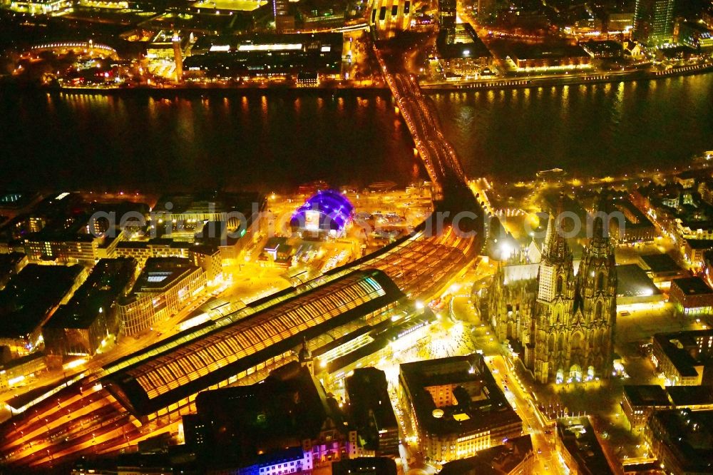 Köln at night from above - Night lighting track progress and building of the main station of the railway in the district Innenstadt in Cologne in the state North Rhine-Westphalia, Germany