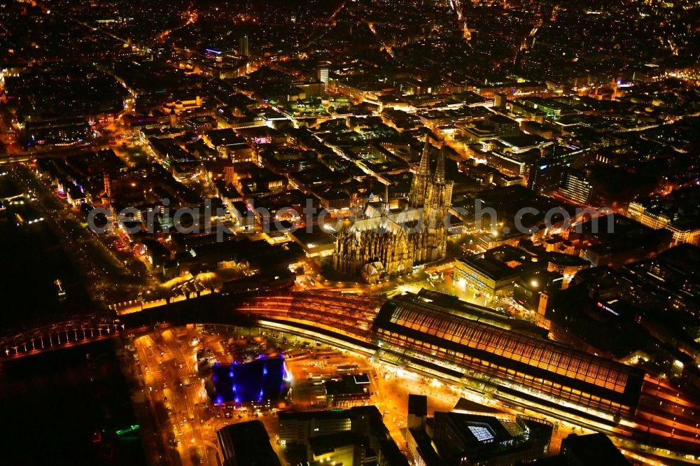 Köln at night from above - Night lighting track progress and building of the main station of the railway in the district Innenstadt in Cologne in the state North Rhine-Westphalia, Germany