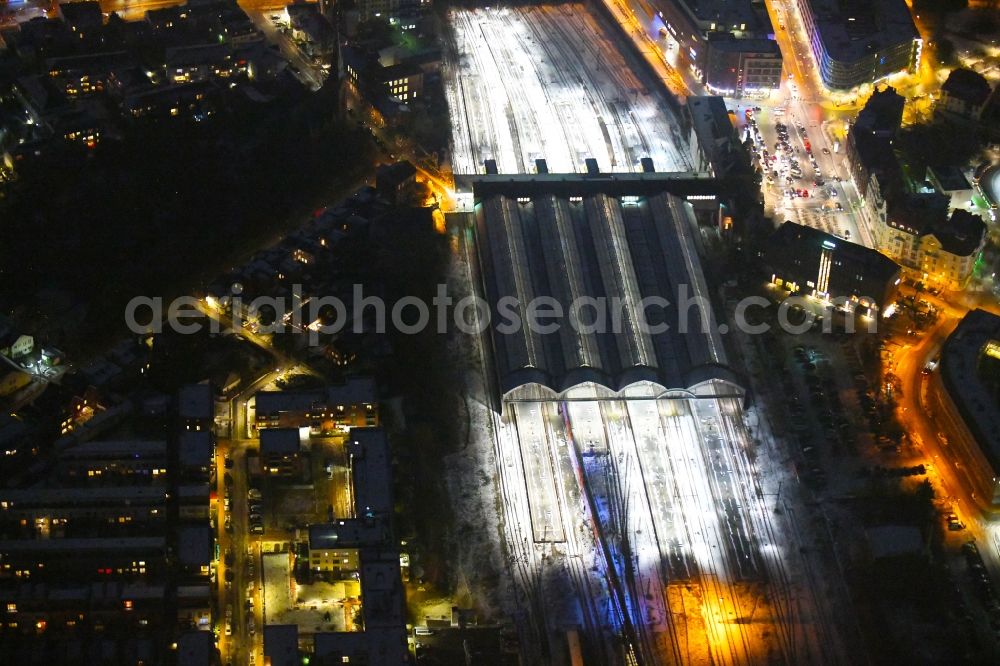 Lübeck at night from the bird perspective: Night lighting main station of the railway in the district Sankt Lorenz Sued in Luebeck in the state Schleswig-Holstein