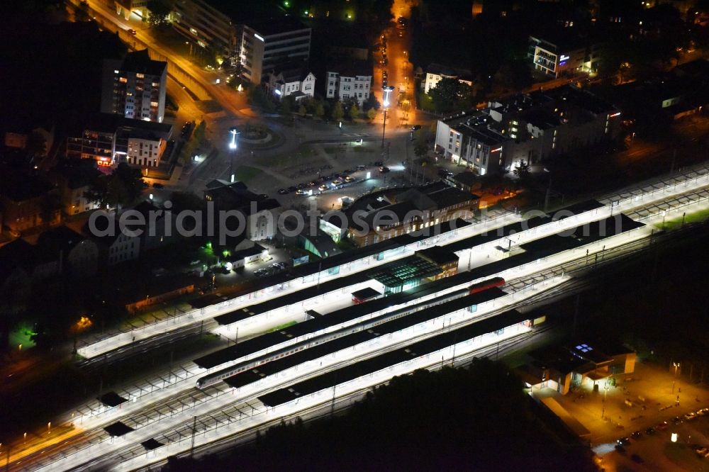 Rostock at night from above - Night lighting Track progress and building of the main station of the railway in Rostock in the state Mecklenburg - Western Pomerania, Germany