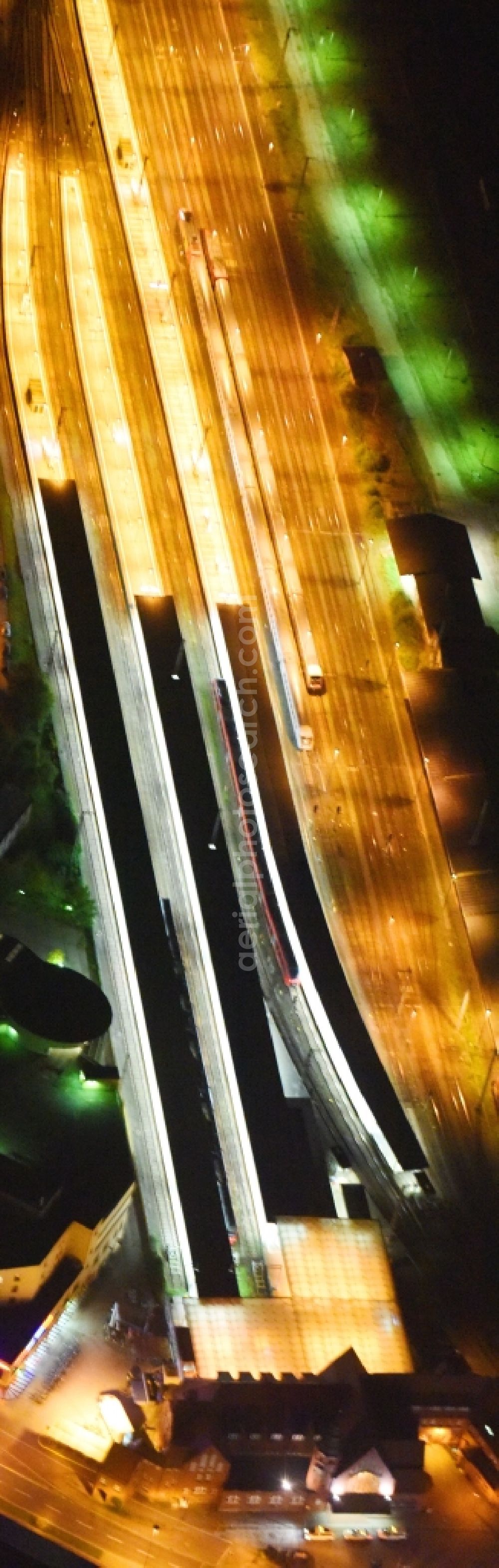 Aerial photograph at night Stralsund - Night lighting Track progress and building of the main station of the railway in Stralsund in the state Mecklenburg - Western Pomerania, Germany