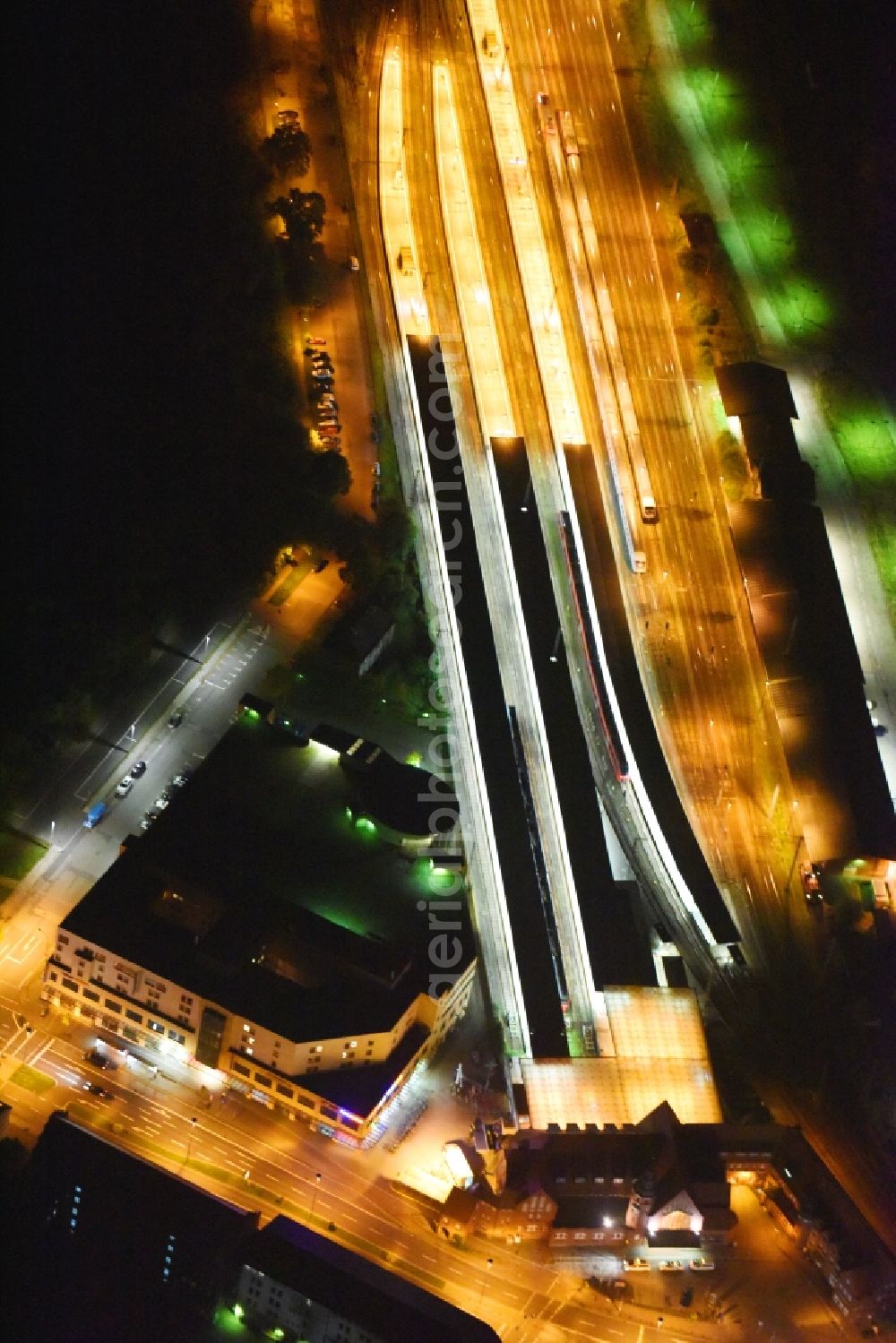 Aerial image at night Stralsund - Night lighting Track progress and building of the main station of the railway in Stralsund in the state Mecklenburg - Western Pomerania, Germany