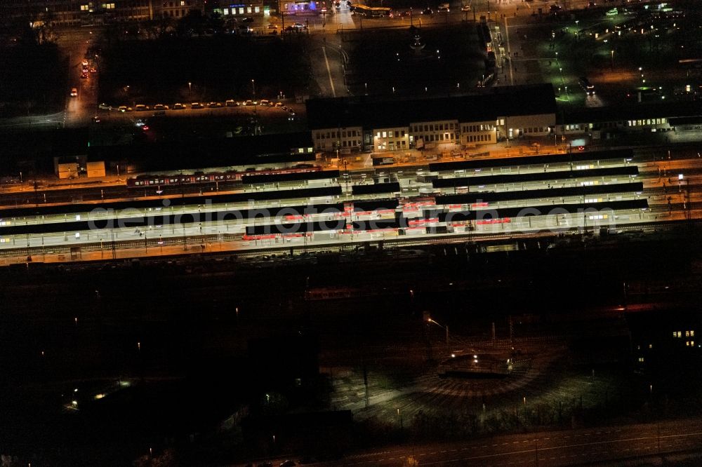 Würzburg at night from above - Night lighting track progress and building of the main station of the railway in Wuerzburg in the state Bavaria, Germany