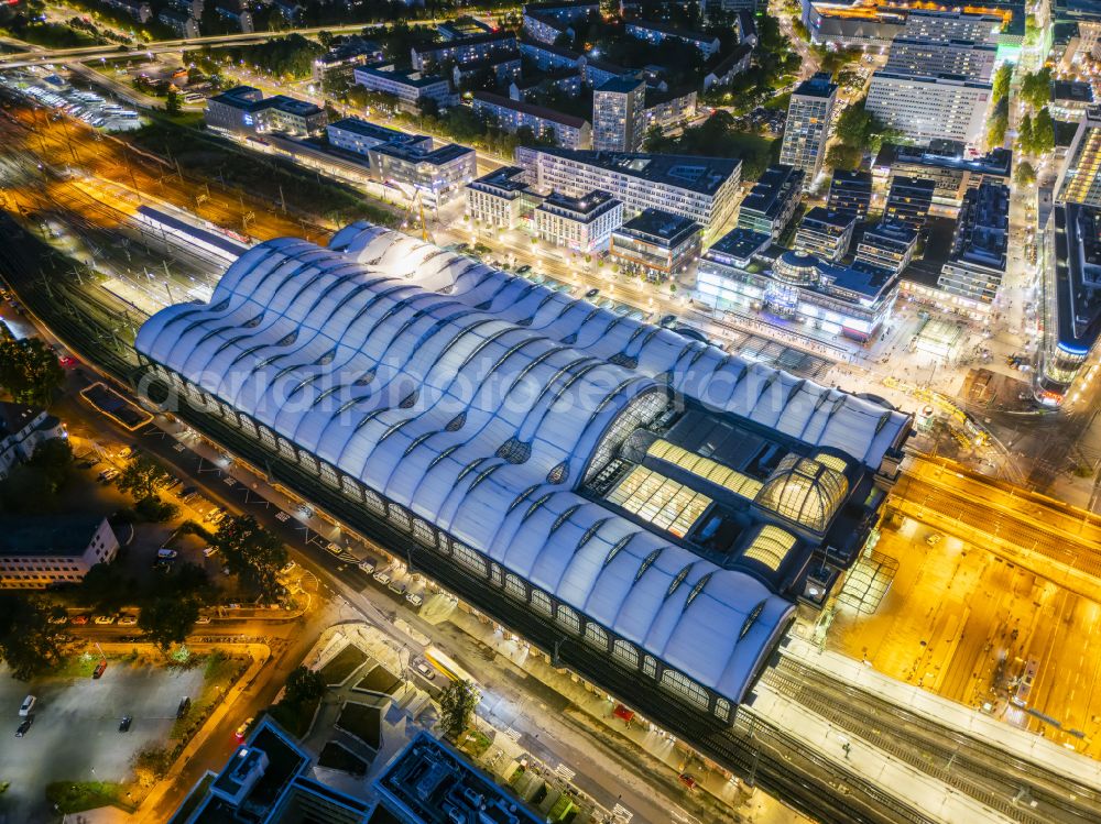 Aerial photograph at night Dresden - Night lighting track progress and building of the main station of the railway in Dresden in the state Saxony, Germany