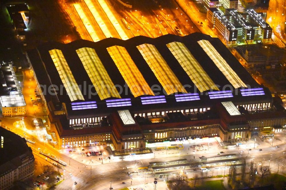 Aerial photograph at night Leipzig - Night lighting view over the building of the main station in Leipzig in Saxony