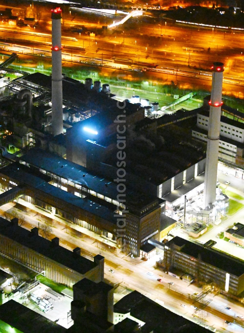 Aerial image at night Berlin - Night lighting combined heat and power station plant Klingenberg on Koepenicker Chaussee in Berlin-Rummelsburg