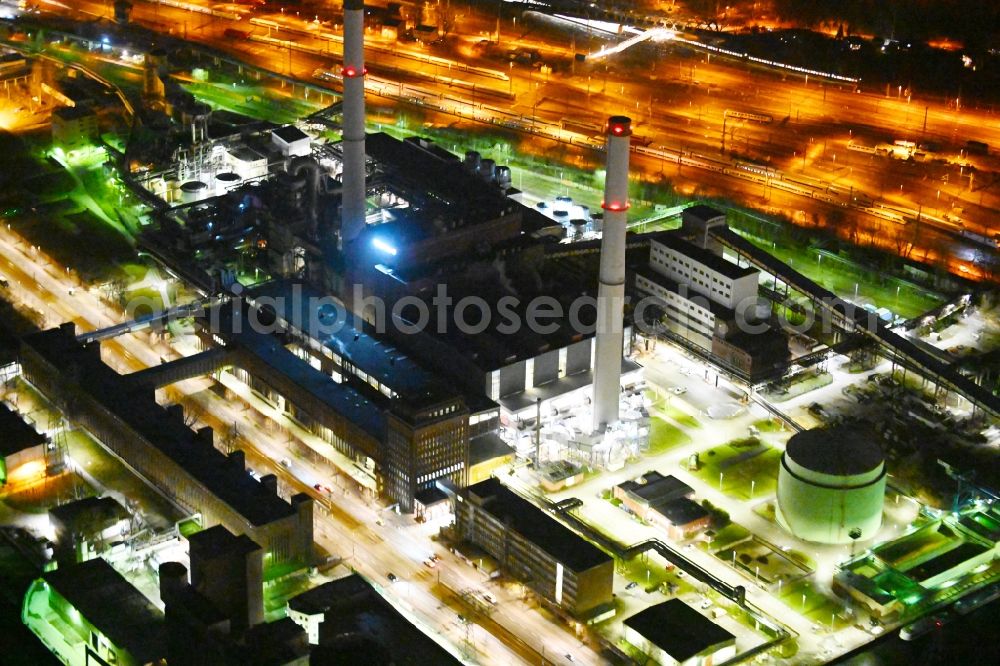 Berlin at night from the bird perspective: Night lighting combined heat and power station plant Klingenberg on Koepenicker Chaussee in Berlin-Rummelsburg