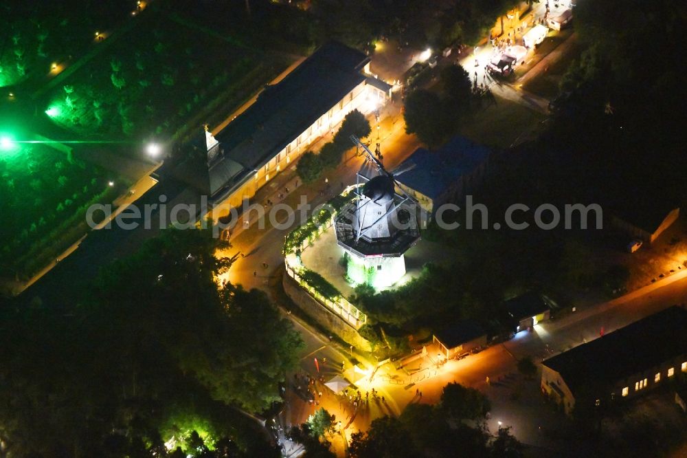 Potsdam at night from above - Night lighting historic windmill on Maulbeerallee in Potsdam in the state Brandenburg, Germany