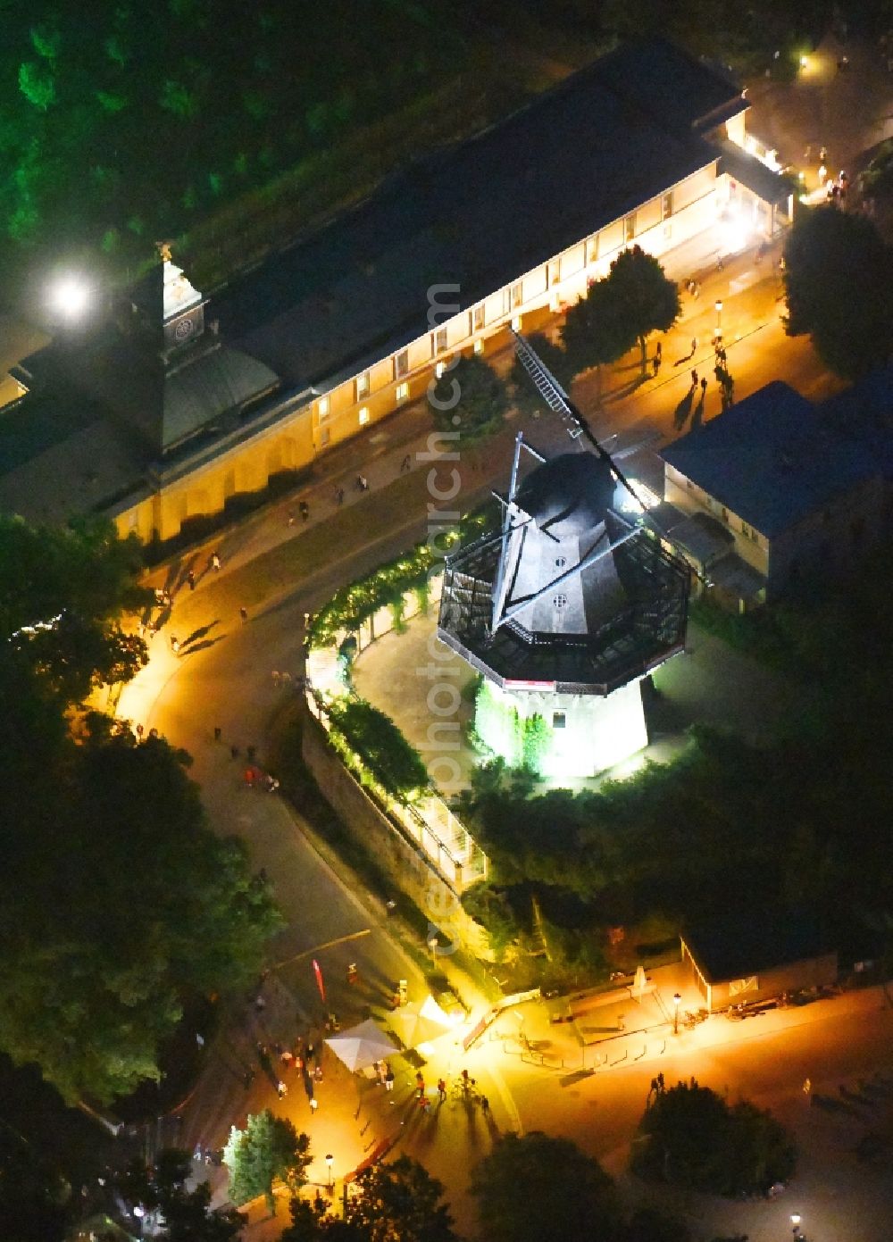 Aerial image at night Potsdam - Night lighting historic windmill on Maulbeerallee in Potsdam in the state Brandenburg, Germany