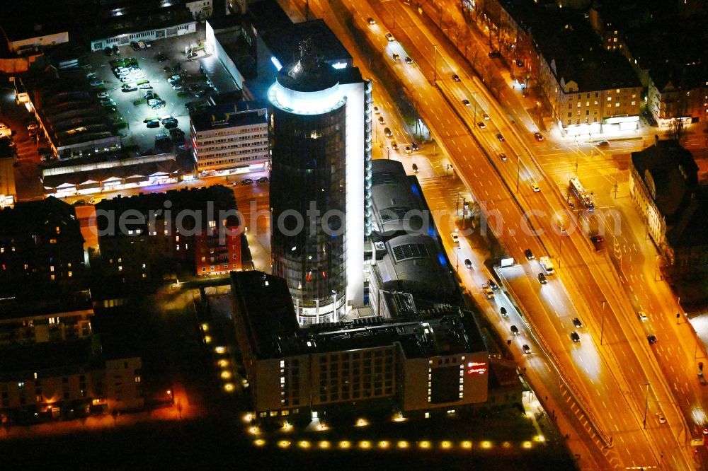 München at night from above - Night lighting construction on Skyscraper Central Tower in Munich in Bavaria