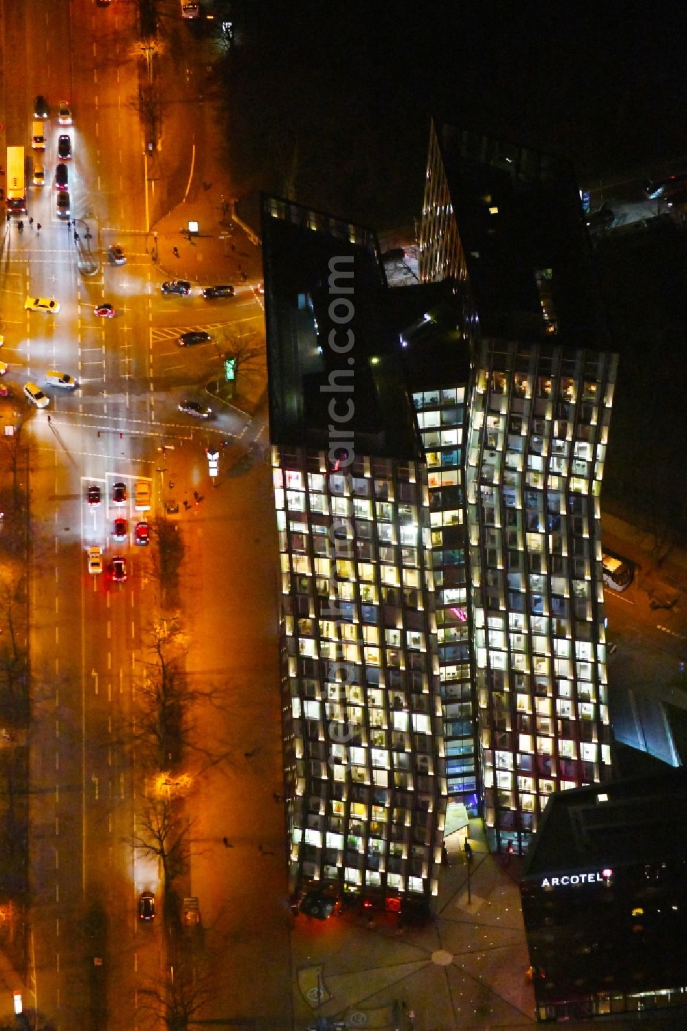 Hamburg at night from above - Night lighting high-rise ensemble of Tanzende Tuerme on corner Reeperbahn - Zirkusweg in the district Sankt Pauli in Hamburg, Germany