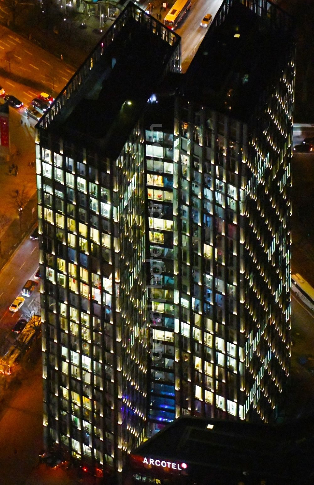 Hamburg at night from above - Night lighting high-rise ensemble of Tanzende Tuerme on corner Reeperbahn - Zirkusweg in the district Sankt Pauli in Hamburg, Germany