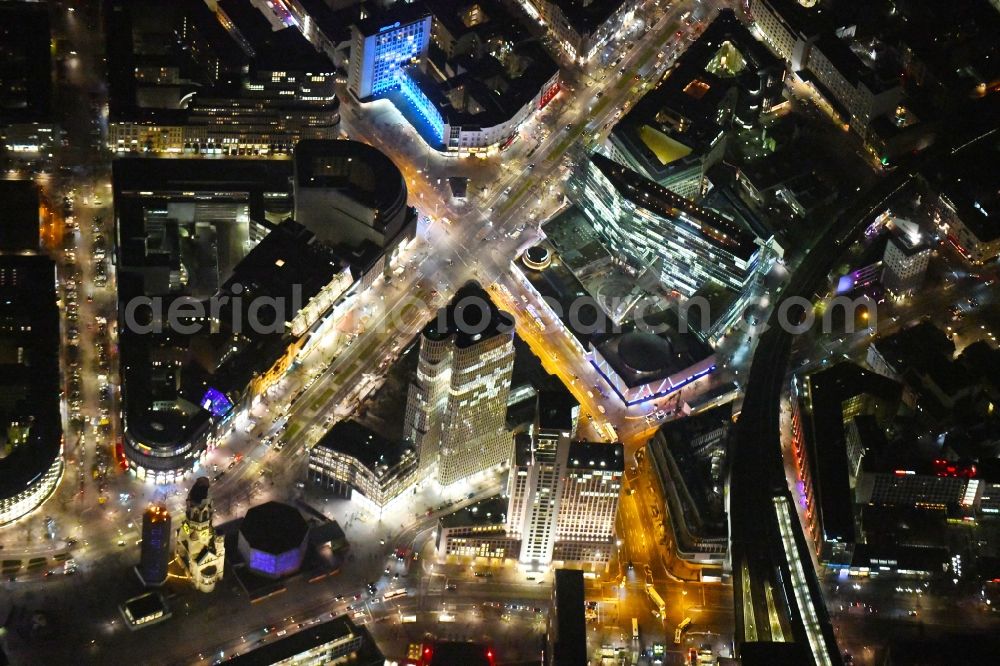 Aerial photograph at night Berlin - Night lighting High-rise ensemble of Zoofenster and Neubau Upper West on Joachinsthaler Strasse - Hardenbergstrasse in Ortsteil Bezirk Charlottenburg in Berlin, Germany