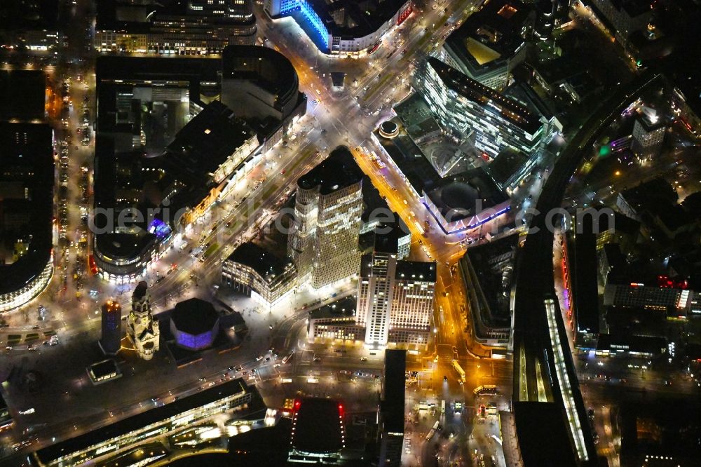 Aerial image at night Berlin - Night lighting High-rise ensemble of Zoofenster and Neubau Upper West on Joachinsthaler Strasse - Hardenbergstrasse in Ortsteil Bezirk Charlottenburg in Berlin, Germany