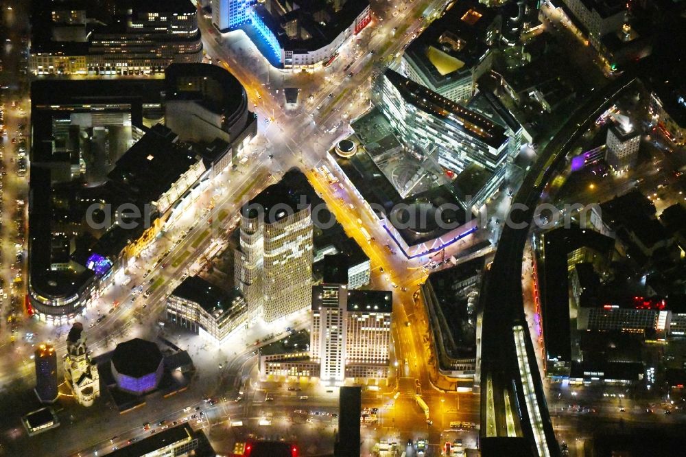 Berlin at night from the bird perspective: Night lighting High-rise ensemble of Zoofenster and Neubau Upper West on Joachinsthaler Strasse - Hardenbergstrasse in Ortsteil Bezirk Charlottenburg in Berlin, Germany