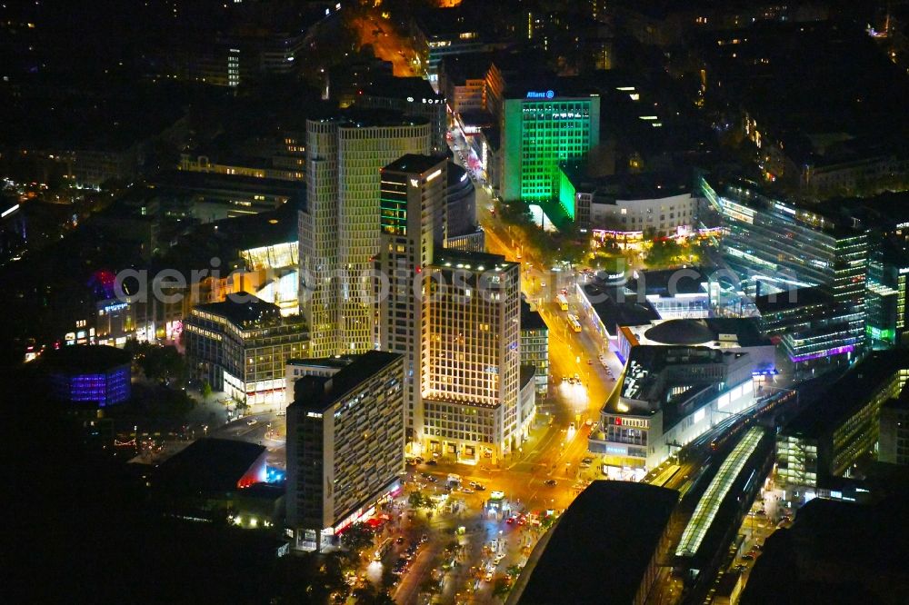 Aerial image at night Berlin - Night lighting High-rise ensemble of Zoofenster and Neubau Upper West on Joachinsthaler Strasse - Hardenbergstrasse in Ortsteil Bezirk Charlottenburg in Berlin, Germany