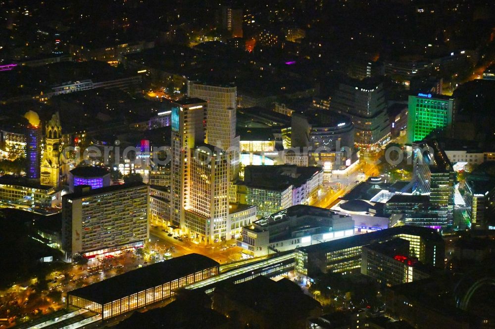 Berlin at night from the bird perspective: Night lighting High-rise ensemble of Zoofenster and Neubau Upper West on Joachinsthaler Strasse - Hardenbergstrasse in Ortsteil Bezirk Charlottenburg in Berlin, Germany