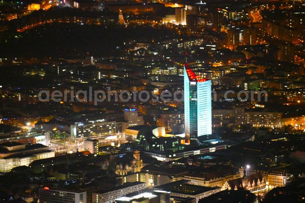 Aerial image at night Leipzig - Night lighting High-rise buildings City-Hochhaus in Leipzig in the state Saxony