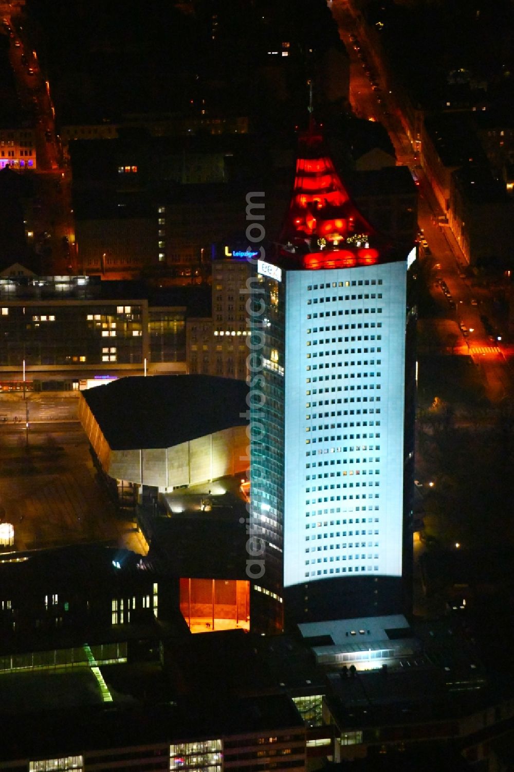 Aerial photograph at night Leipzig - Night lighting High-rise buildings City-Hochhaus in Leipzig in the state Saxony