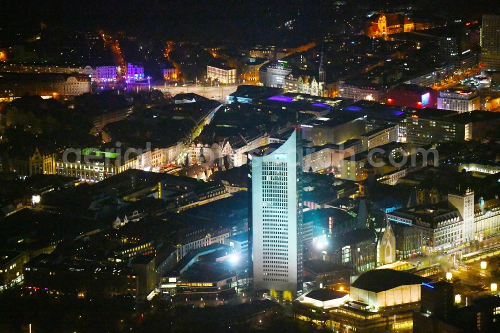 Aerial image at night Leipzig - Night lighting High-rise buildings City-Hochhaus in Leipzig in the state Saxony