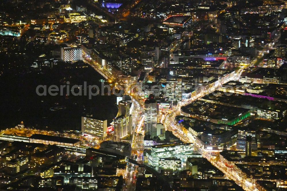 Aerial image at night Berlin - Night lighting high-rise building of the hotel complex Hotel Motel One Berlin-Upper West on Kantstrasse in Berlin, Germany