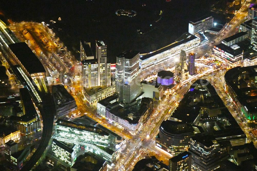 Aerial image at night Berlin - Night lighting high-rise building of the hotel complex Hotel Motel One Berlin-Upper West on Kantstrasse in Berlin, Germany