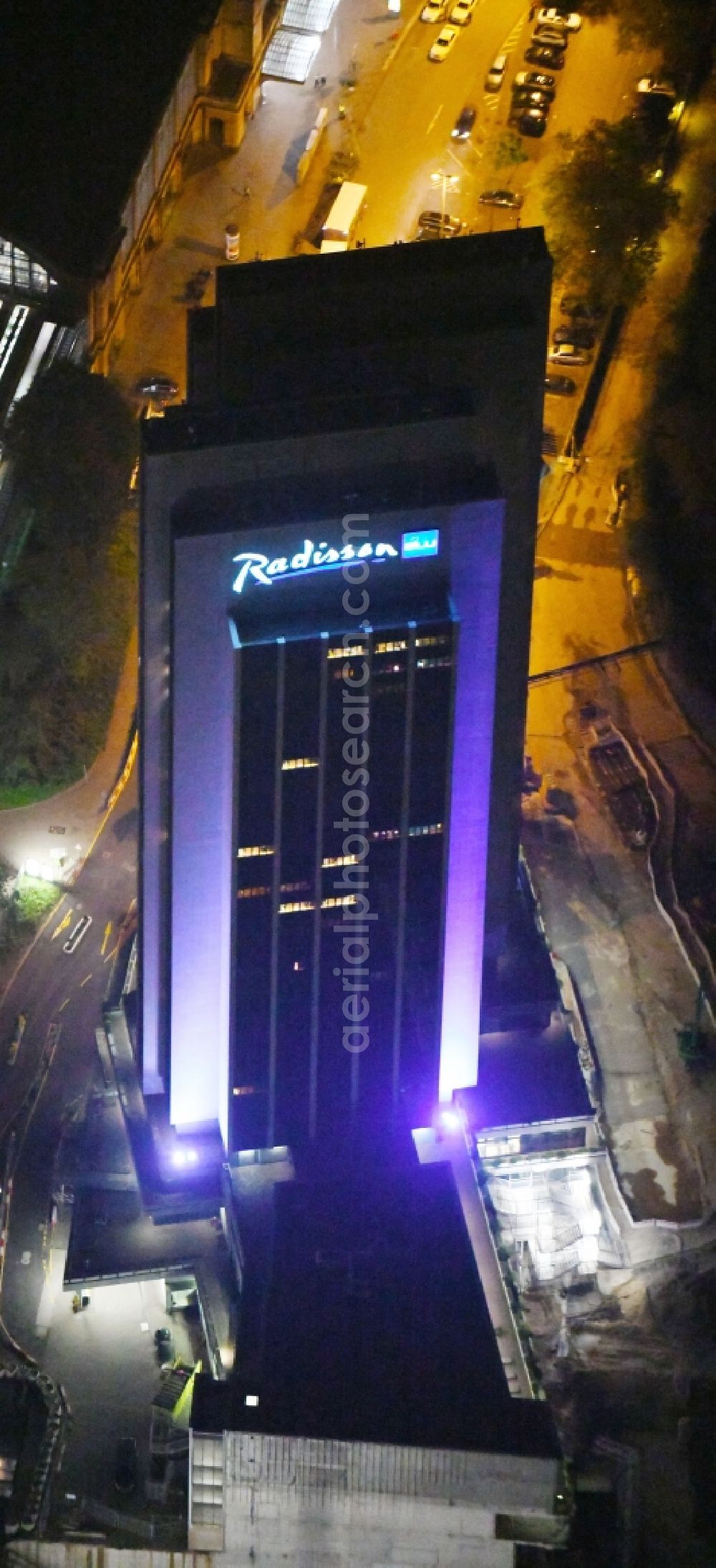 Hamburg at night from above - Night lighting High-rise building of the hotel complex Radisson Blu on Marseiller Strasse in Hamburg, Germany