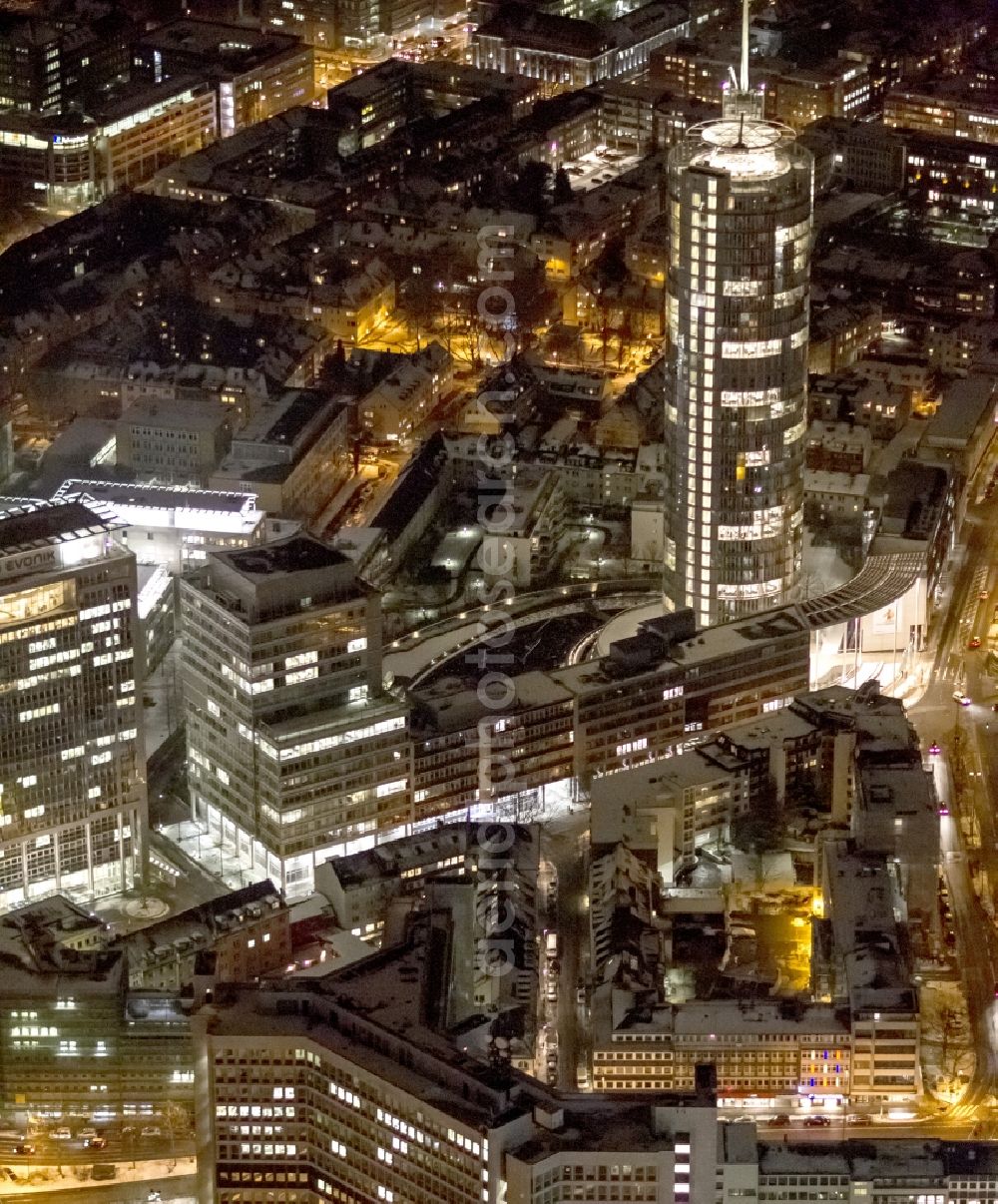 Aerial photograph at night Essen - View of the RWE headquarters in Essen at night. The RWE Tower is with 120 meters and up to 500 workplaces the headquarter of the energy supplier RWE. The tower is designed ecological and gains energy from natural daylight and solar heat