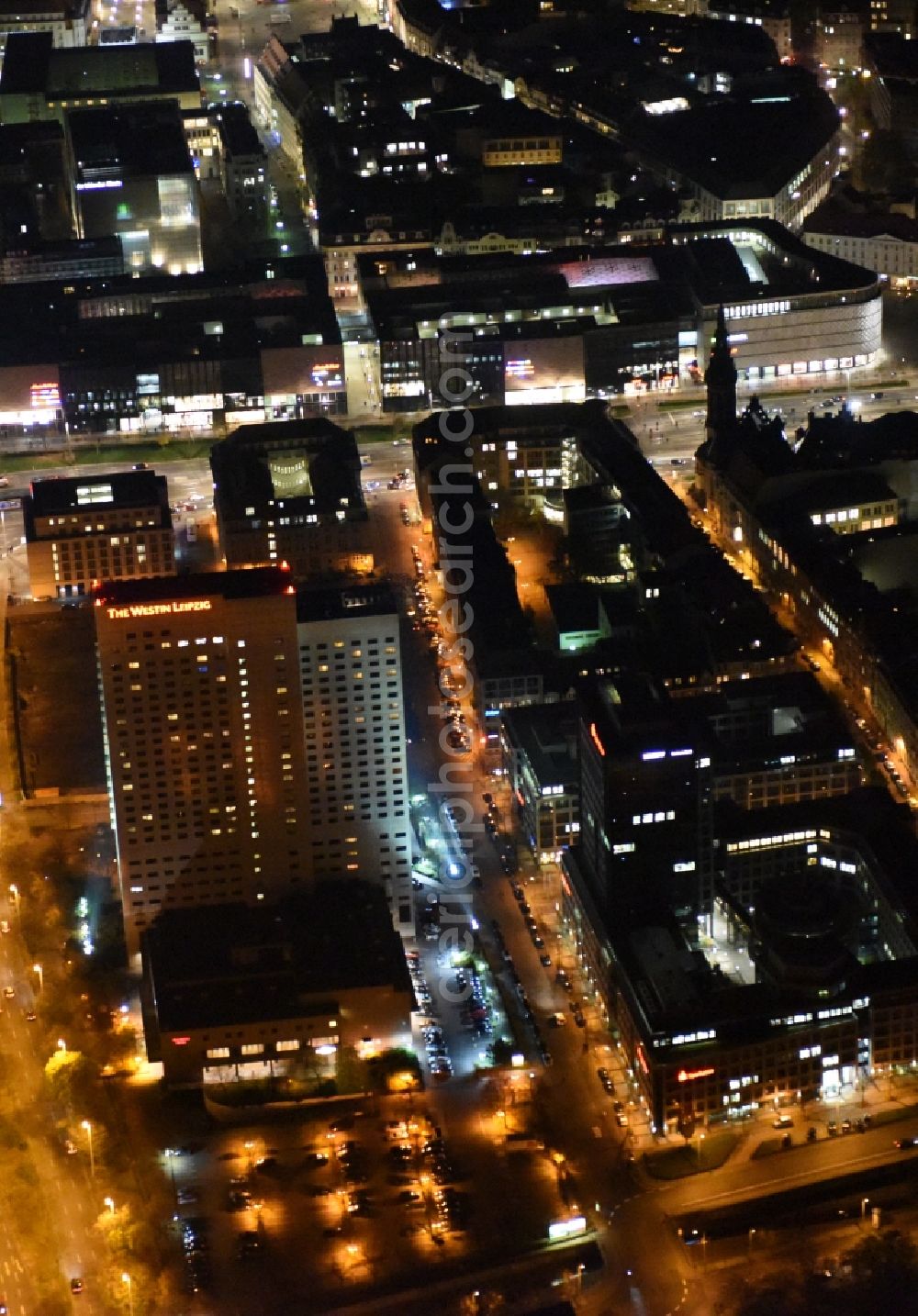 Aerial photograph at night Leipzig - Night aerial view of hotel building high-rise The Westin Leipzig on Gerberstrasse in Leipzig in the state of Saxony