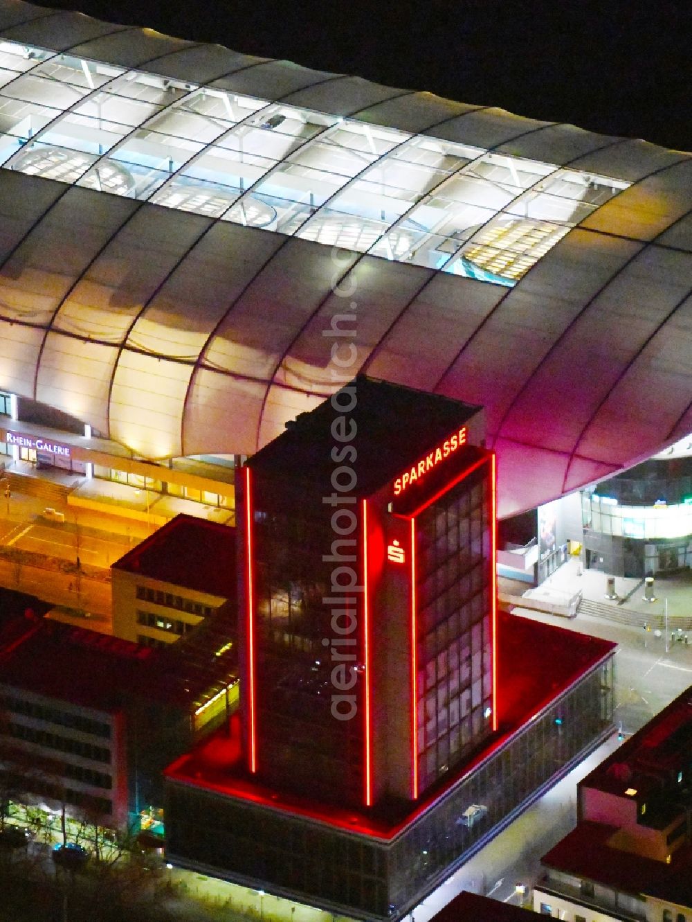 Ludwigshafen am Rhein at night from above - Night lighting high-rise skyscraper building and bank administration of the financial services company Sparkasse Vorderpfalz - Hauptstelle on Ludwigstrasse in the district Mitte in Ludwigshafen am Rhein in the state Rhineland-Palatinate, Germany