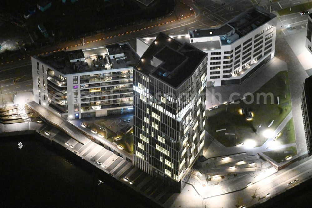 Hamburg at night from above - Night lighting office and commercial building WATERMARK, Intelligent Quarters und Universitaet Hamburg in the Hafen City in Hamburg, Germany