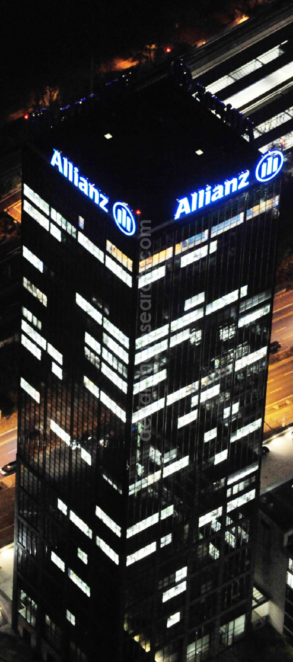 Berlin at night from the bird perspective: Night lighting office buildings and commercial high-rise complex Treptower on street An den Treptowers in the district Treptow in Berlin, Germany