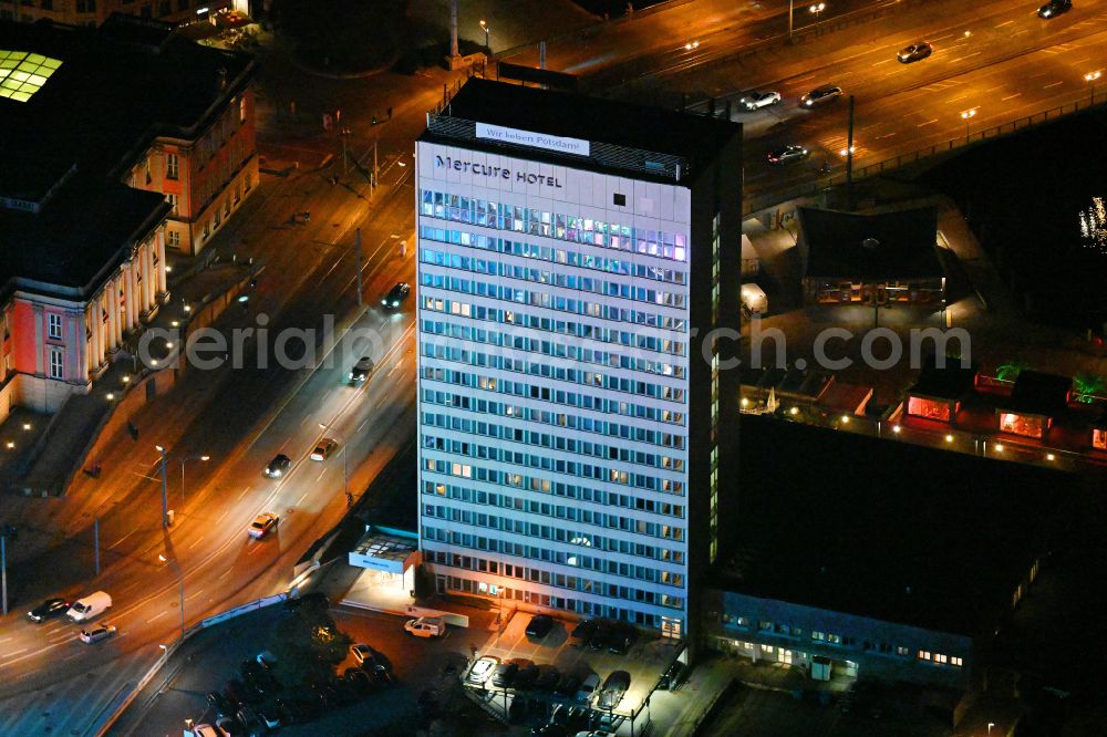 Aerial photograph at night Potsdam - Night lighting high-rise building of the hotel complex Mercure Hotel Potsdam City on street Lange Bruecke in Potsdam in the state Brandenburg, Germany