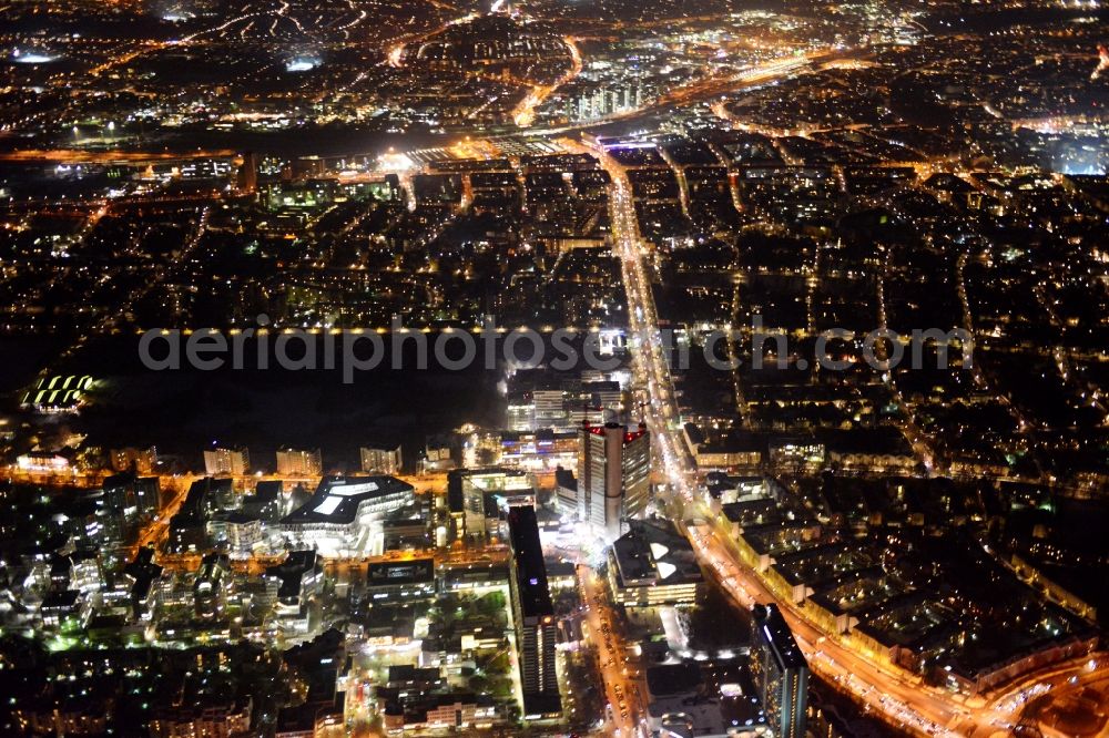 München Bogenhausen at night from the bird perspective: Night aerial tower HVB - UniCredit Bank and the Sheraton Munich Arabellapark Hotel in Bogenhausen district of Munich in Bavaria