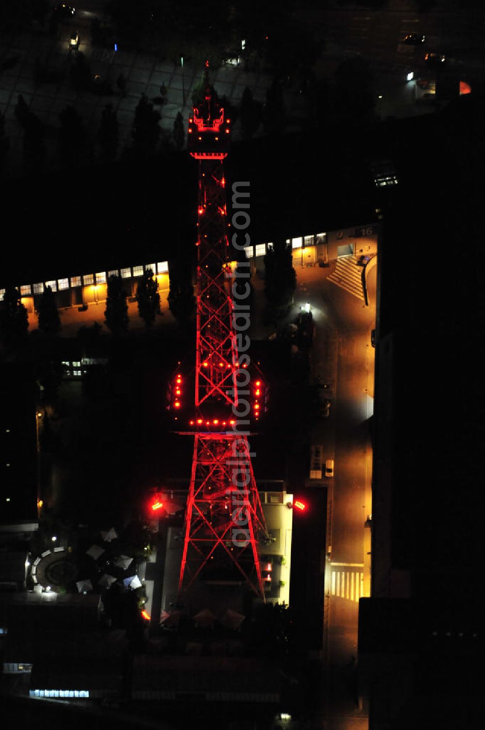 Aerial image at night Berlin - Nachtaufnahme: Internationales Congress Centrum ICC am Messegelände mit Funkturm und Avus in Charlottenburg. Night Shot: Internationales Congress Centrum ICC at the fairground with radio tower and Avus - ring-road in Berlin.