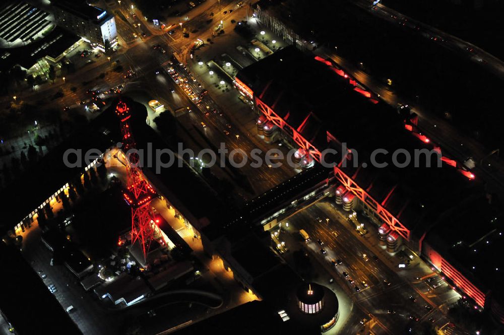 Berlin at night from above - Nachtaufnahme: Internationales Congress Centrum ICC am Messegelände mit Funkturm und Avus in Charlottenburg. Night Shot: Internationales Congress Centrum ICC at the fairground with radio tower and Avus - ring-road in Berlin.