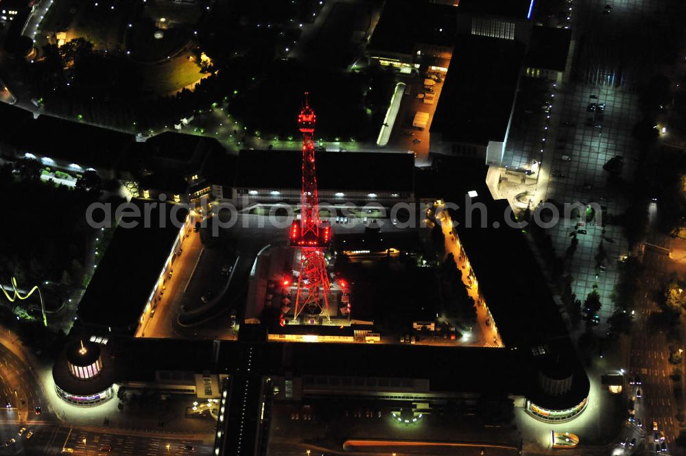 Aerial image at night Berlin - Nachtaufnahme: Internationales Congress Centrum ICC am Messegelände mit Funkturm und Avus in Charlottenburg. Night Shot: Internationales Congress Centrum ICC at the fairground with radio tower and Avus - ring-road in Berlin.