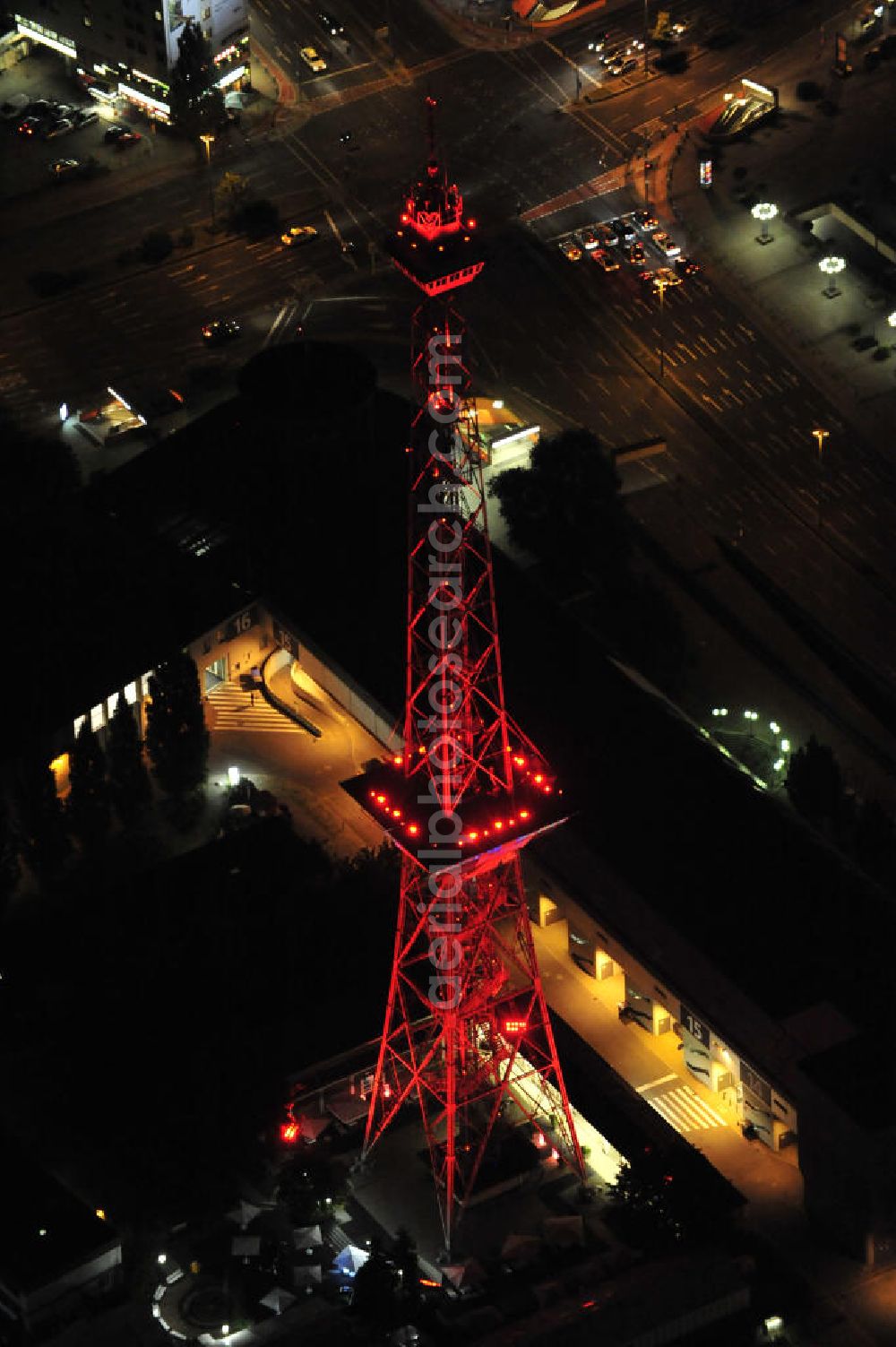 Aerial image at night Berlin - Nachtaufnahme: Internationales Congress Centrum ICC am Messegelände mit Funkturm und Avus in Charlottenburg. Night Shot: Internationales Congress Centrum ICC at the fairground with radio tower and Avus - ring-road in Berlin.