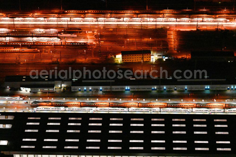 Berlin at night from above - Night lighting building of ICE-Werk Berlin Rummelsburg on street Gundelfinger Strasse in the district Rummelsburg in Berlin, Germany