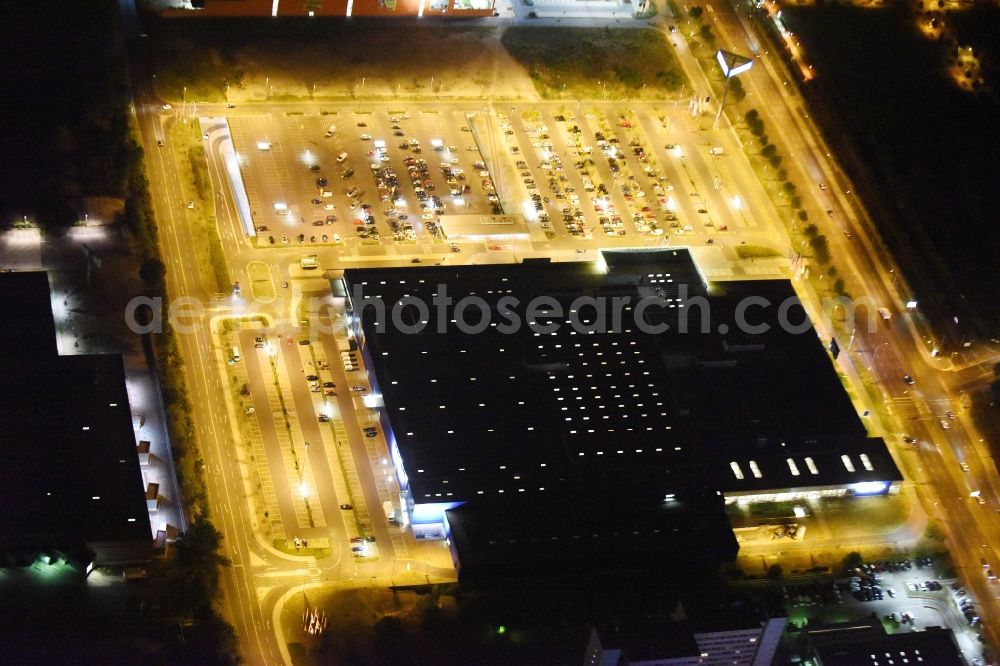 Aerial image at night Berlin - Night view IKEA furniture store - Furniture Center at the Landsberger Allee in Berlin - Hohenschonhausen