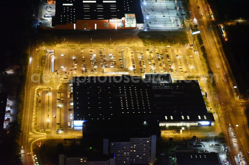 Aerial image at night Berlin - Night view IKEA furniture store - Furniture Center at the Landsberger Allee in Berlin - Hohenschonhausen