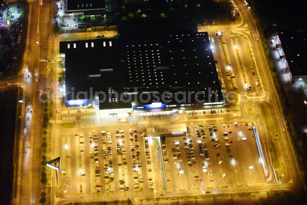 Aerial photograph at night Berlin - Night view IKEA furniture store - Furniture Center at the Landsberger Allee in Berlin - Hohenschonhausen