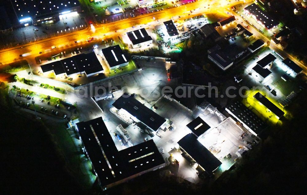 Aerial image at night Berlin - Night lighting Industrial and commercial area along the Strasse Alt-Mahlsdorf in the district Mahlsdorf in Berlin, Germany