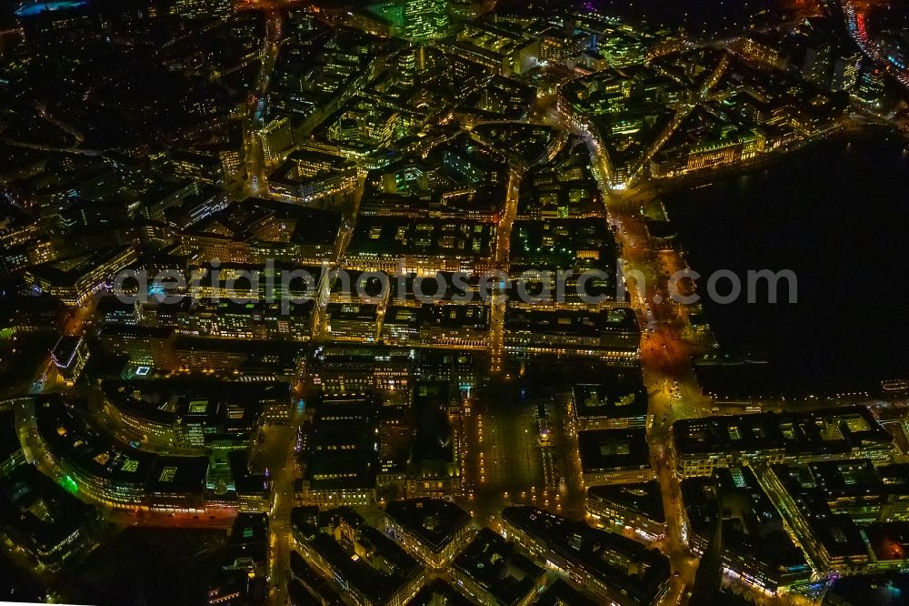 Aerial image at night Hamburg - Night lighting city view of the downtown area on the shore areas of Binnenalster Am Jungfernstieg in the district Altstadt in Hamburg, Germany