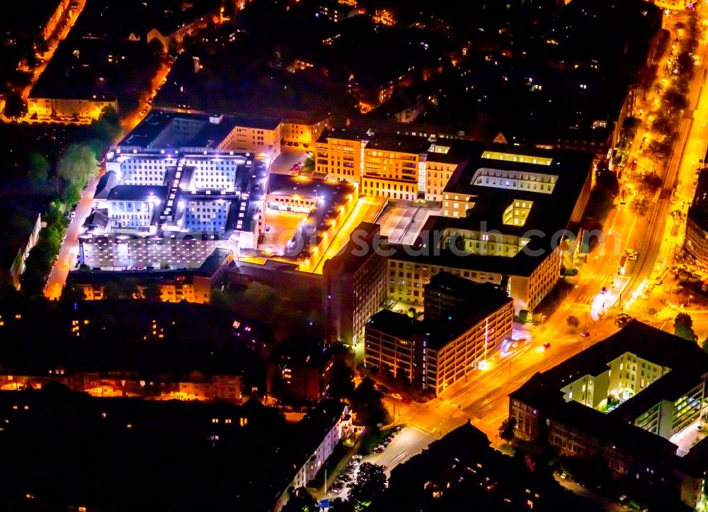 Aerial photograph at night Essen - Night lighting judiciary in Essen at Ruhrgebiet in the state North Rhine-Westphalia