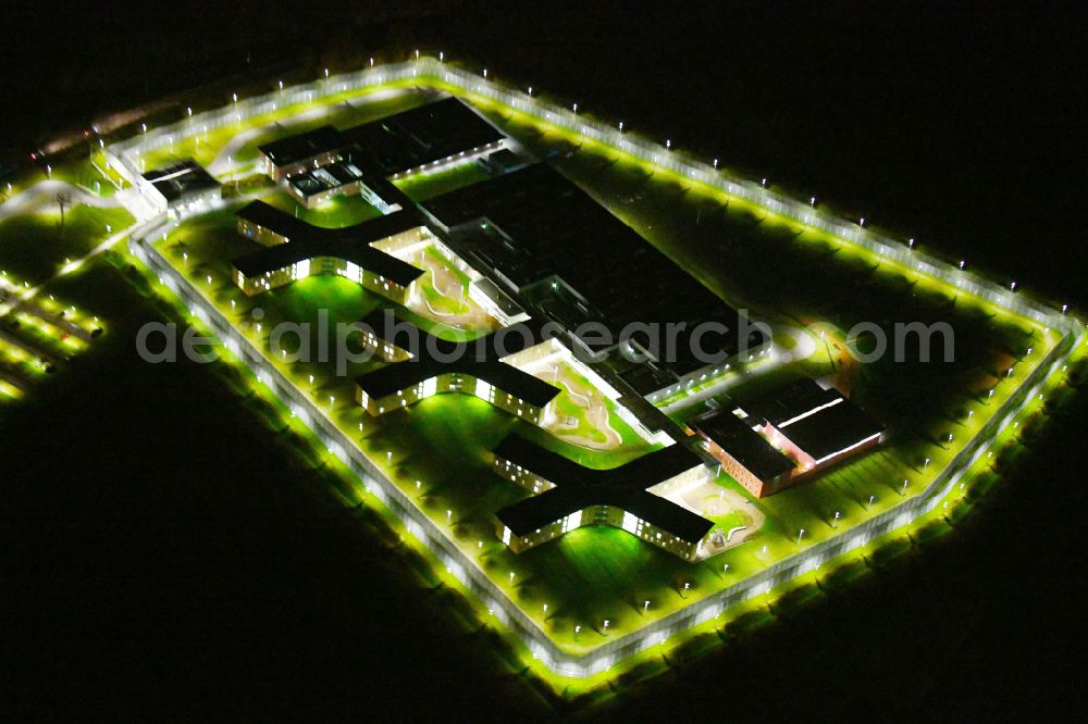 Aerial image at night Großbeeren - Night lighting prison Heidering Grossbeeren in Teltow-Flaming in Brandenburg