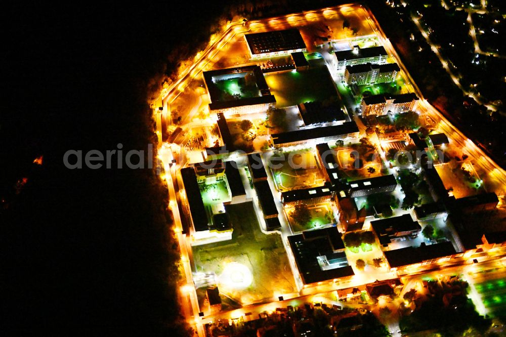 Berlin at night from above - Night lighting prison grounds and high security fence Prison Tegel on Seidelstrasse in the district Reinickendorf in Berlin, Germany