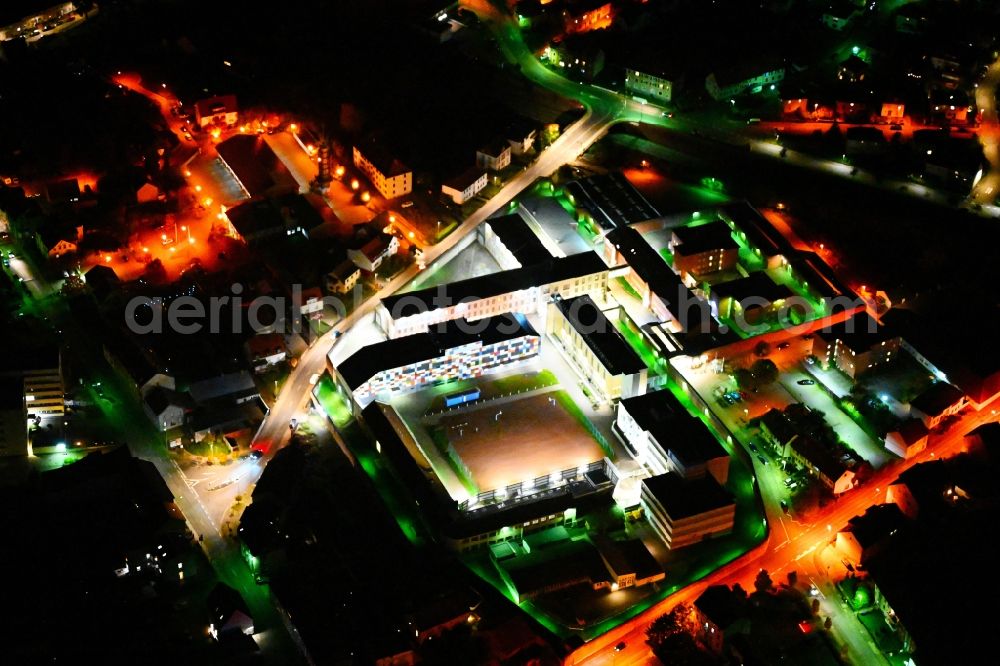 Zweibrücken at night from above - Night lighting prison grounds and high security fence Prison on Johann-Schwebel-Strasse in Zweibruecken Westpfalz in the state Rhineland-Palatinate, Germany