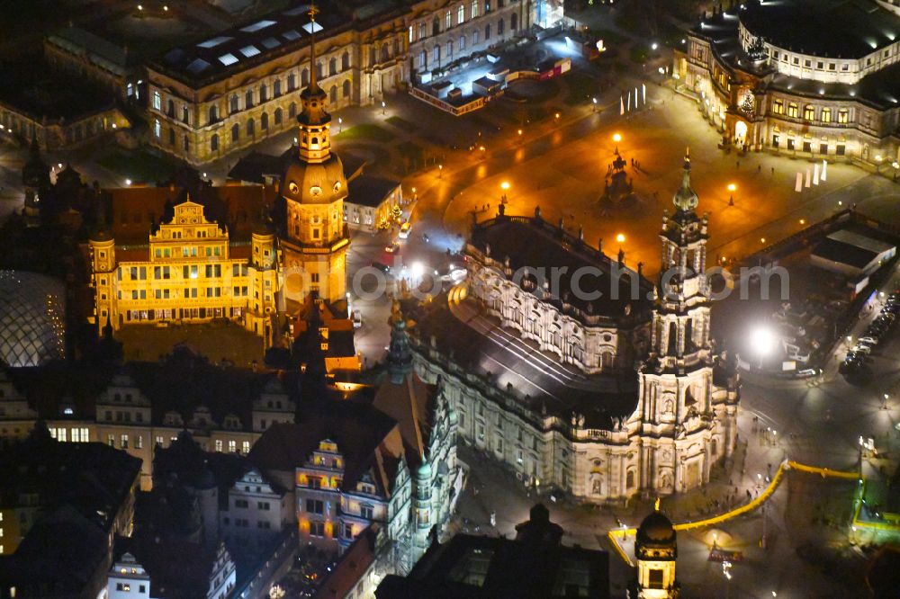 Aerial image at night Dresden - Night lighting church building of the cathedral of Kathedrale Sanctissimae Trinitatis -Dresdner Hofkirche on street Schlossstrasse in the district Altstadt in Dresden in the state Saxony, Germany